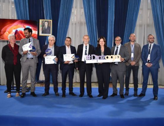 DjazInnov awards ceremony at Djazagro 2024. Group of winners and organizers holding trophies and certificates