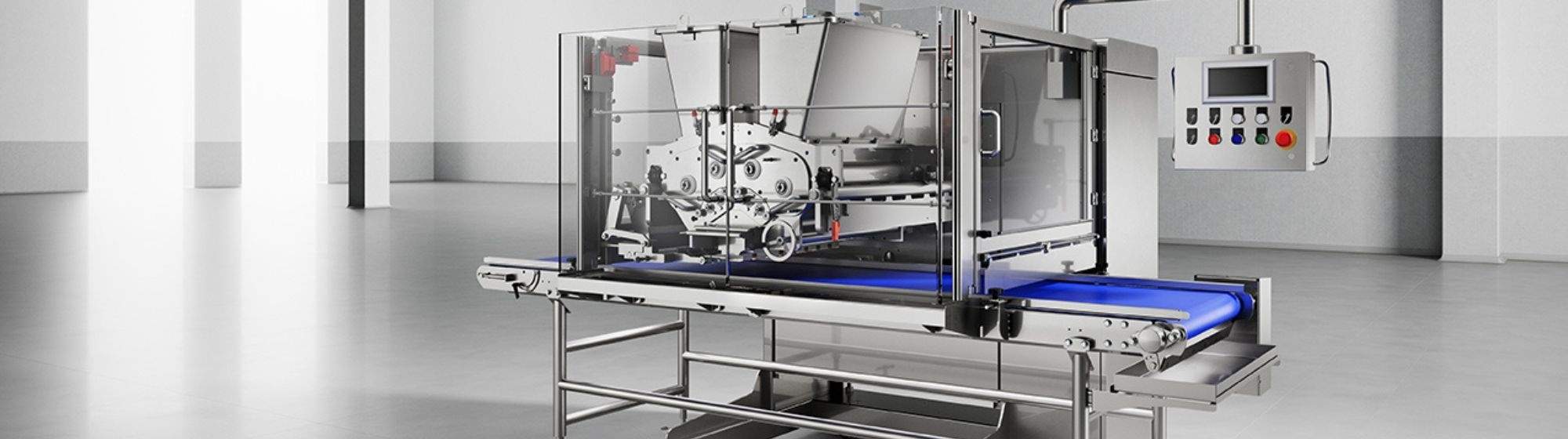 Industrial food processing machine with a sleek design, placed in a modern, empty production facility