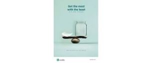 Minimalist ad showing a jar balanced with a feather and a pebble.