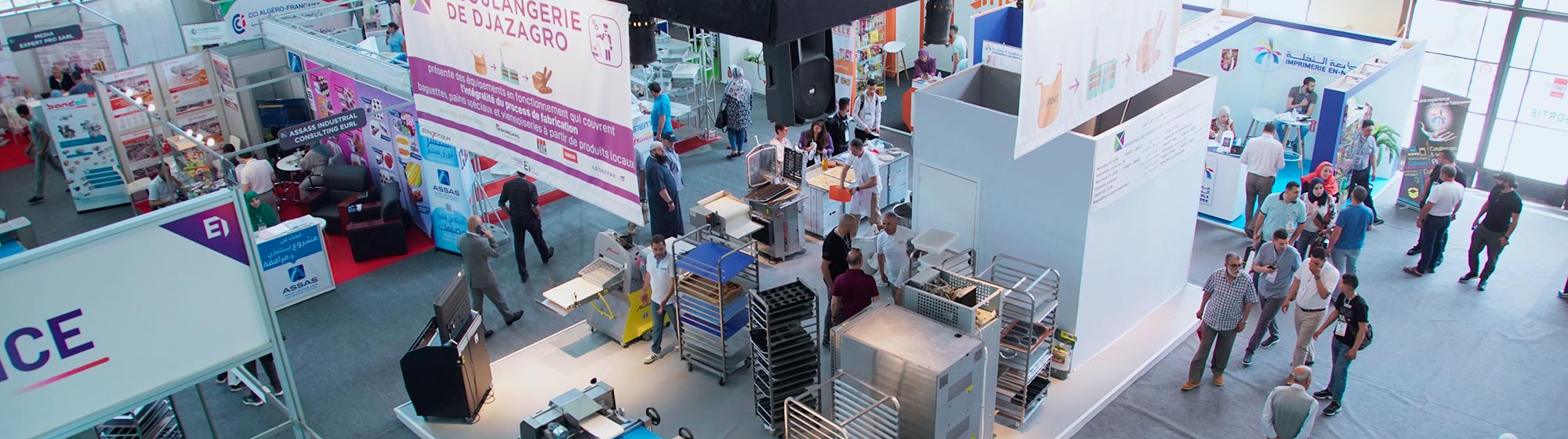 Visitors walking through the exhibition hall