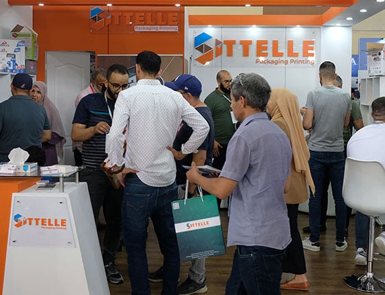 Visitors waiting in front of a stand