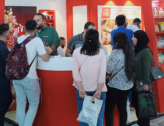 Visitors to the Nuts Raya stand